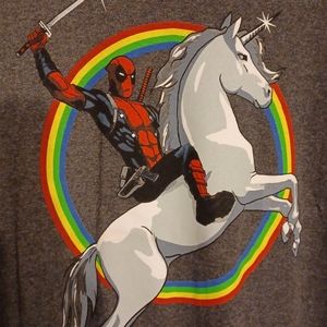 Deadpool riding a unicorn